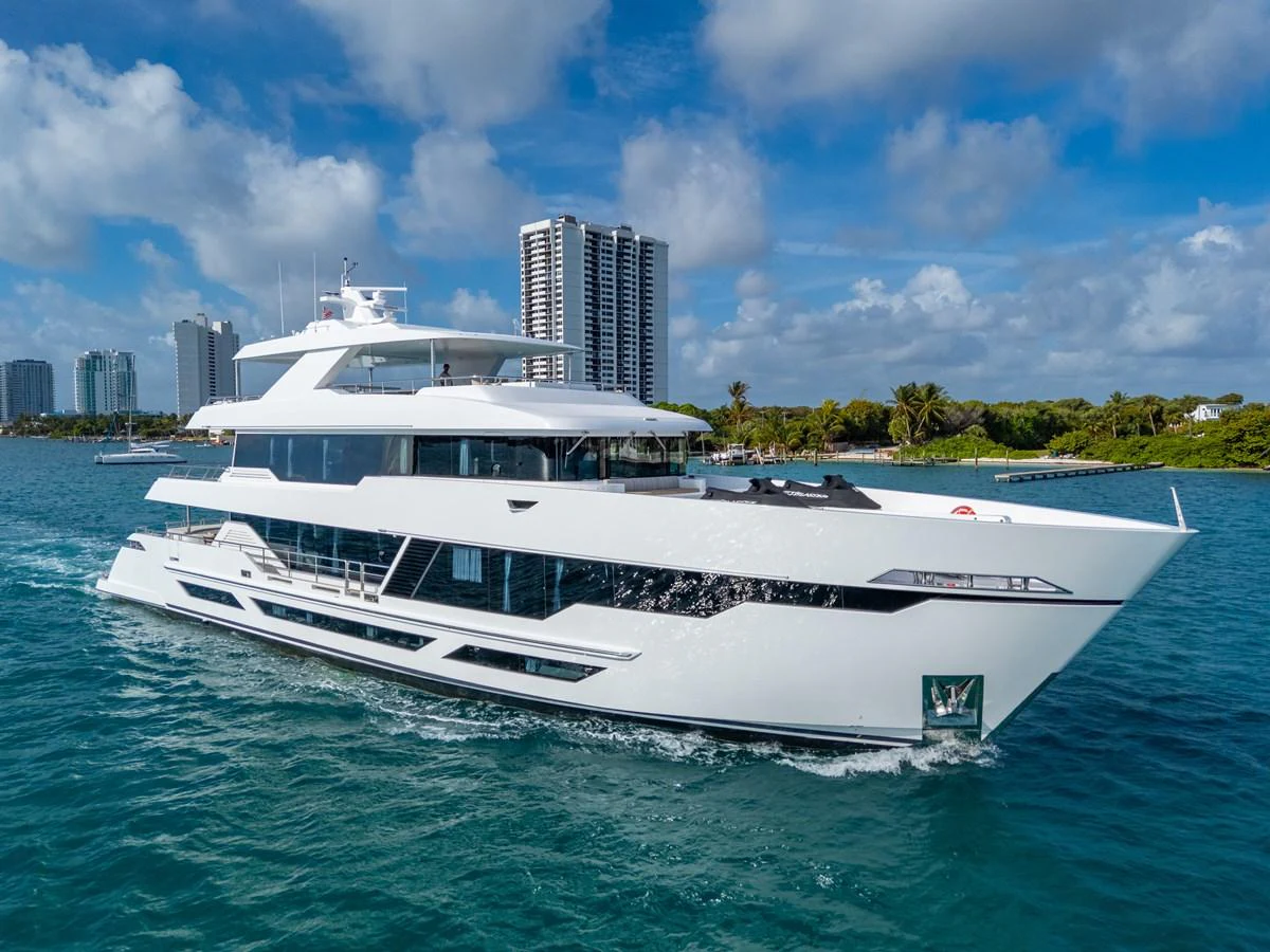 a white yacht in the water aboard RESONANCE Yacht for Sale