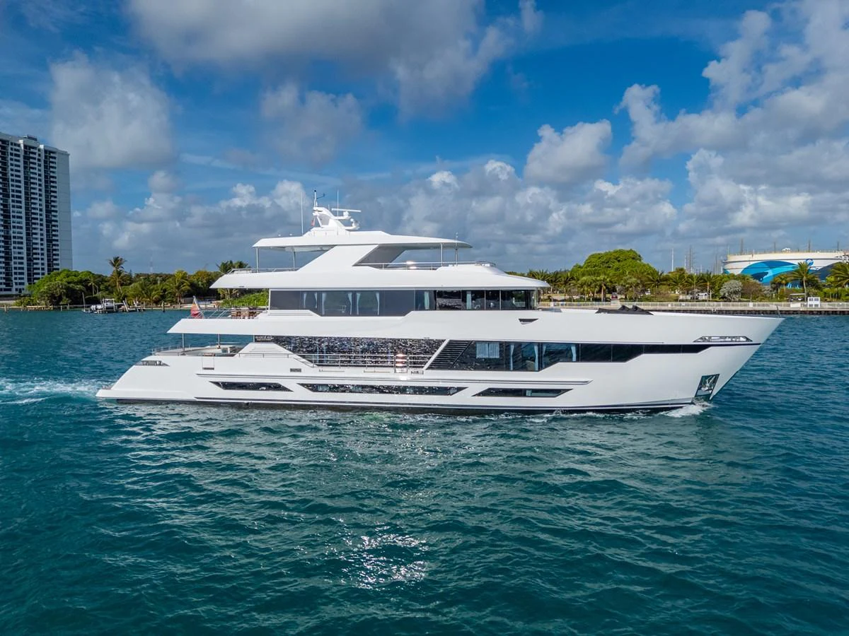 a white yacht on the water aboard RESONANCE Yacht for Sale