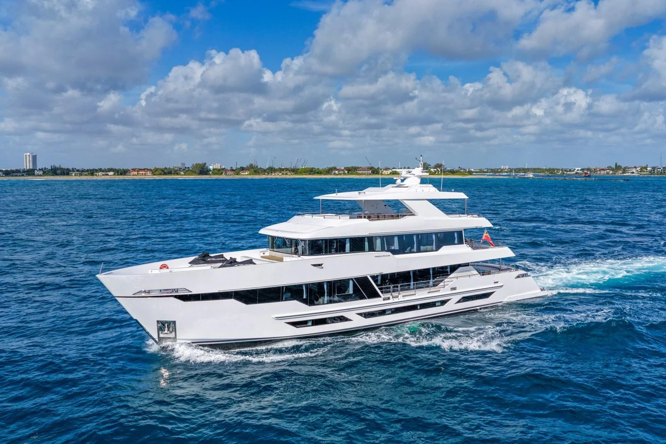 a white yacht on the water aboard RESONANCE Yacht for Sale