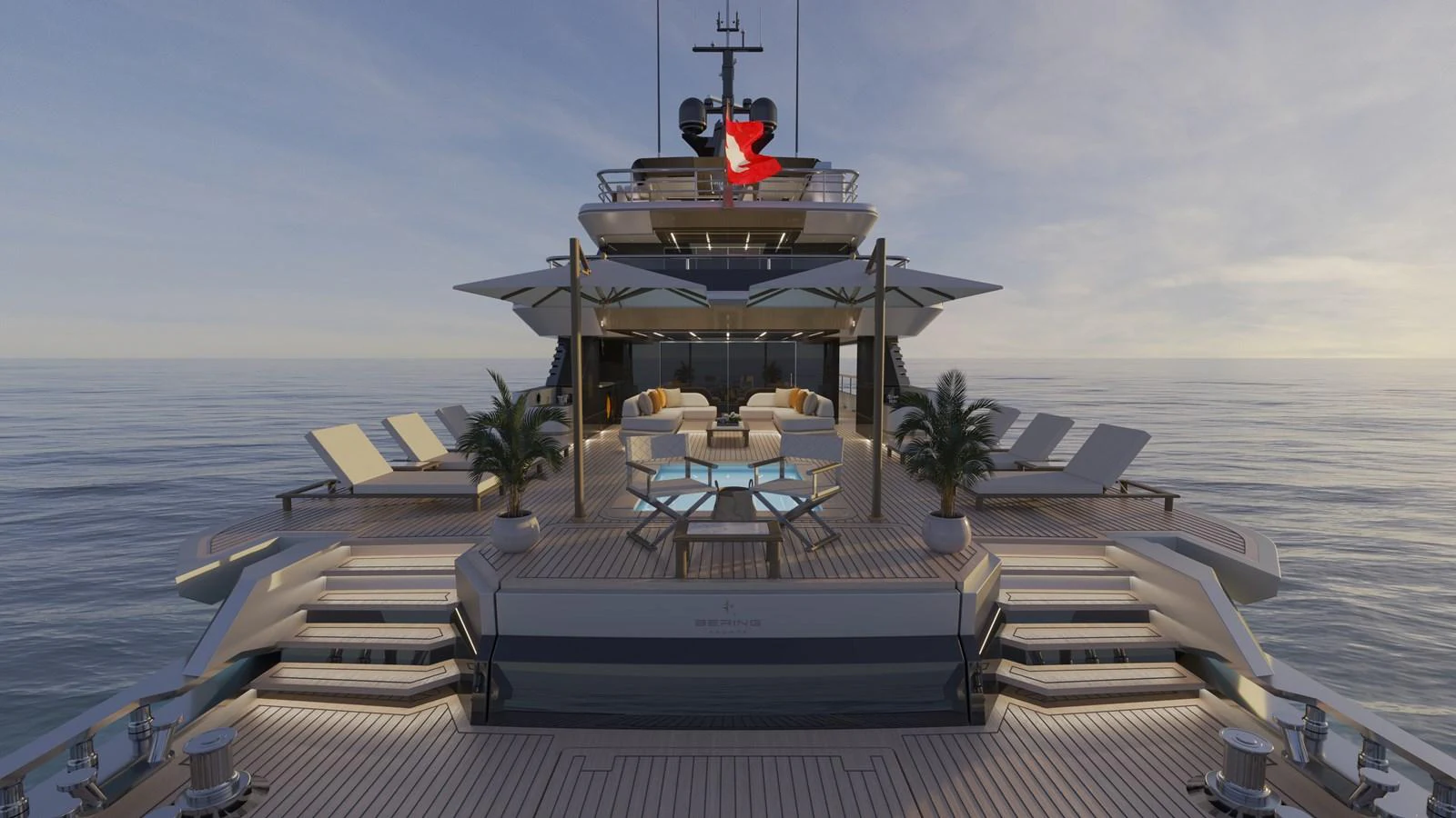 a deck with a lounge chair and a large body of water aboard B130 Yacht for Sale