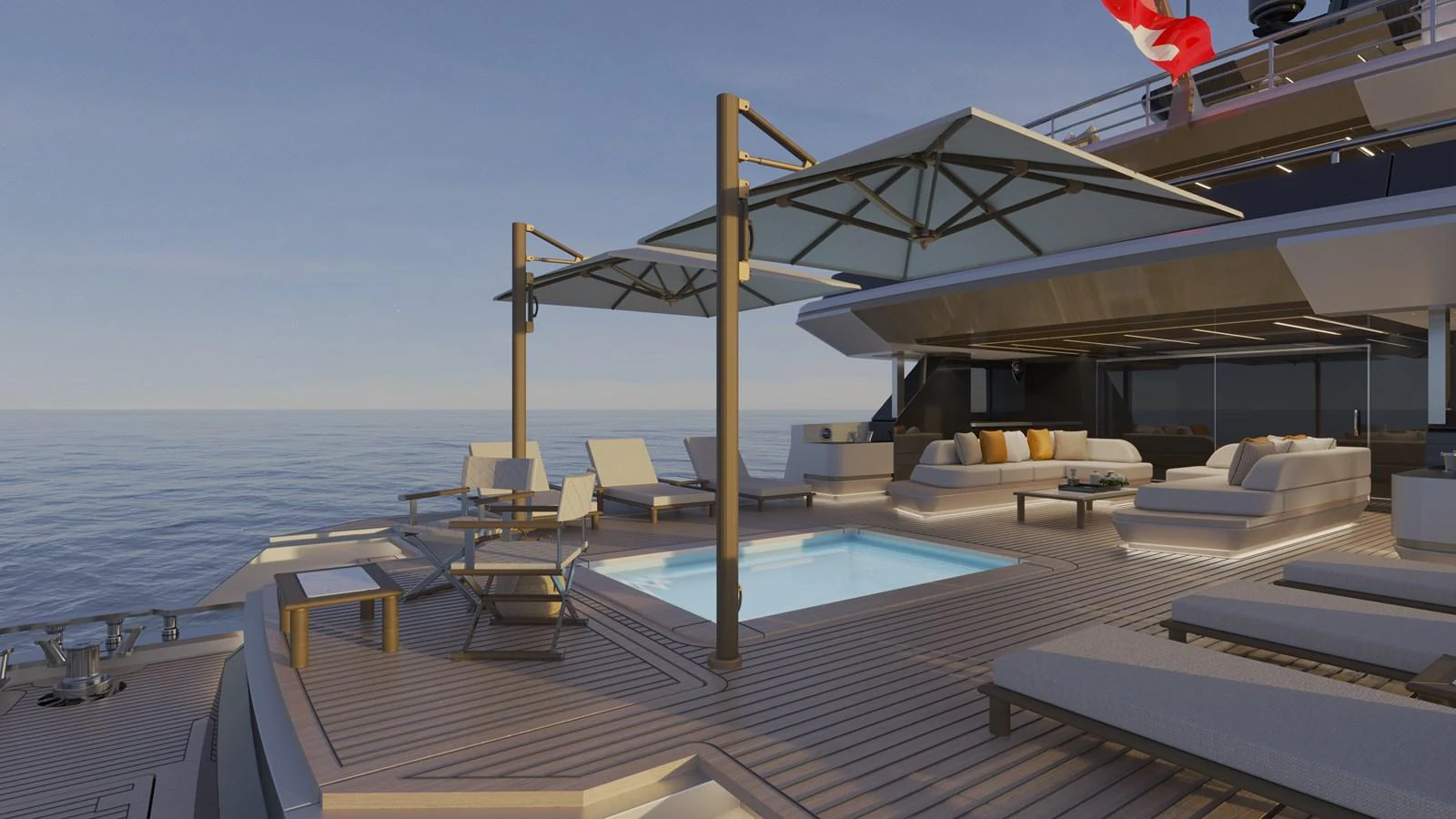 a deck with a pool and lounge chairs on it aboard B130 Yacht for Sale
