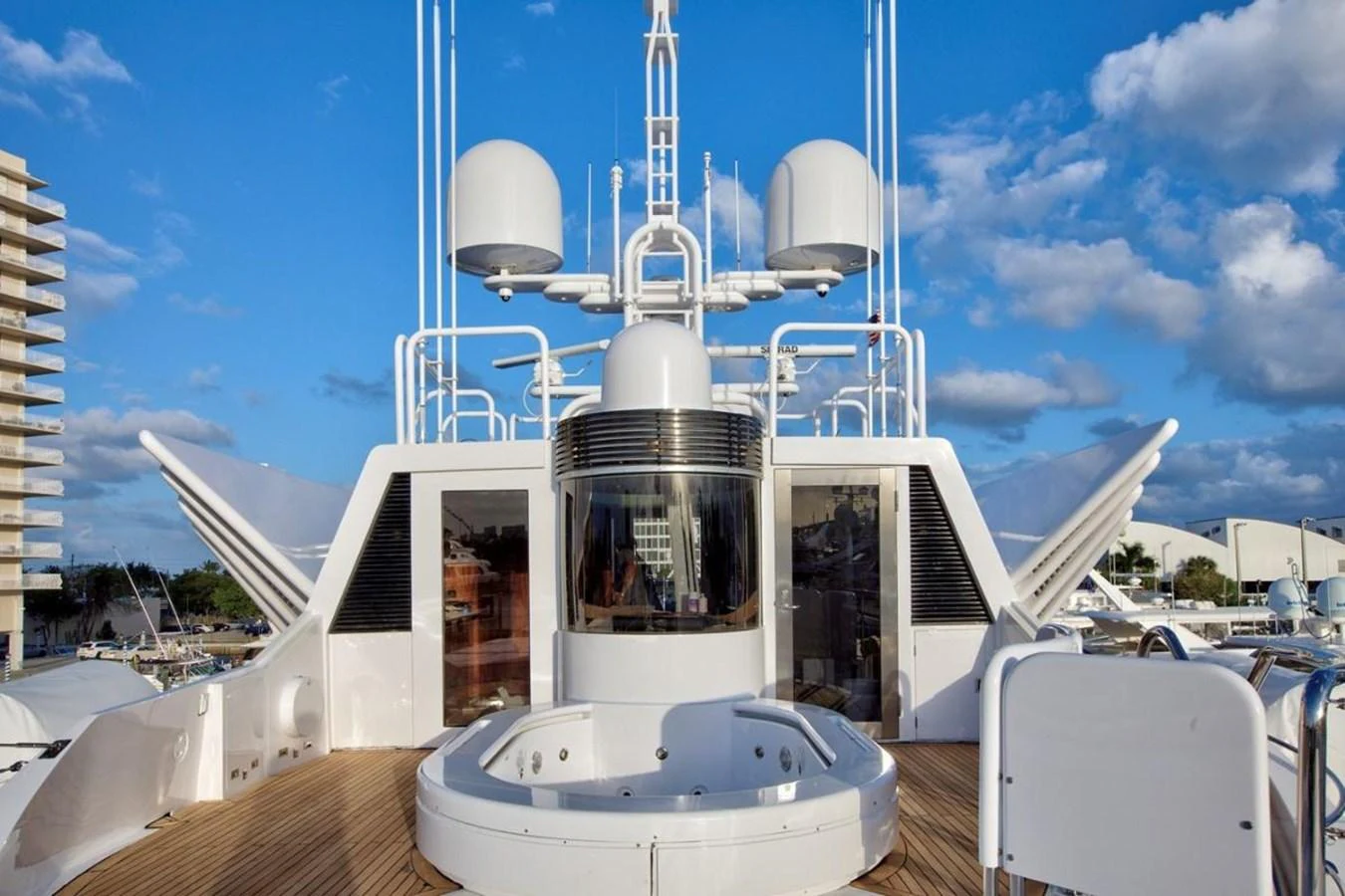 a white boat on a deck aboard ALL STAR 1 Yacht for Sale