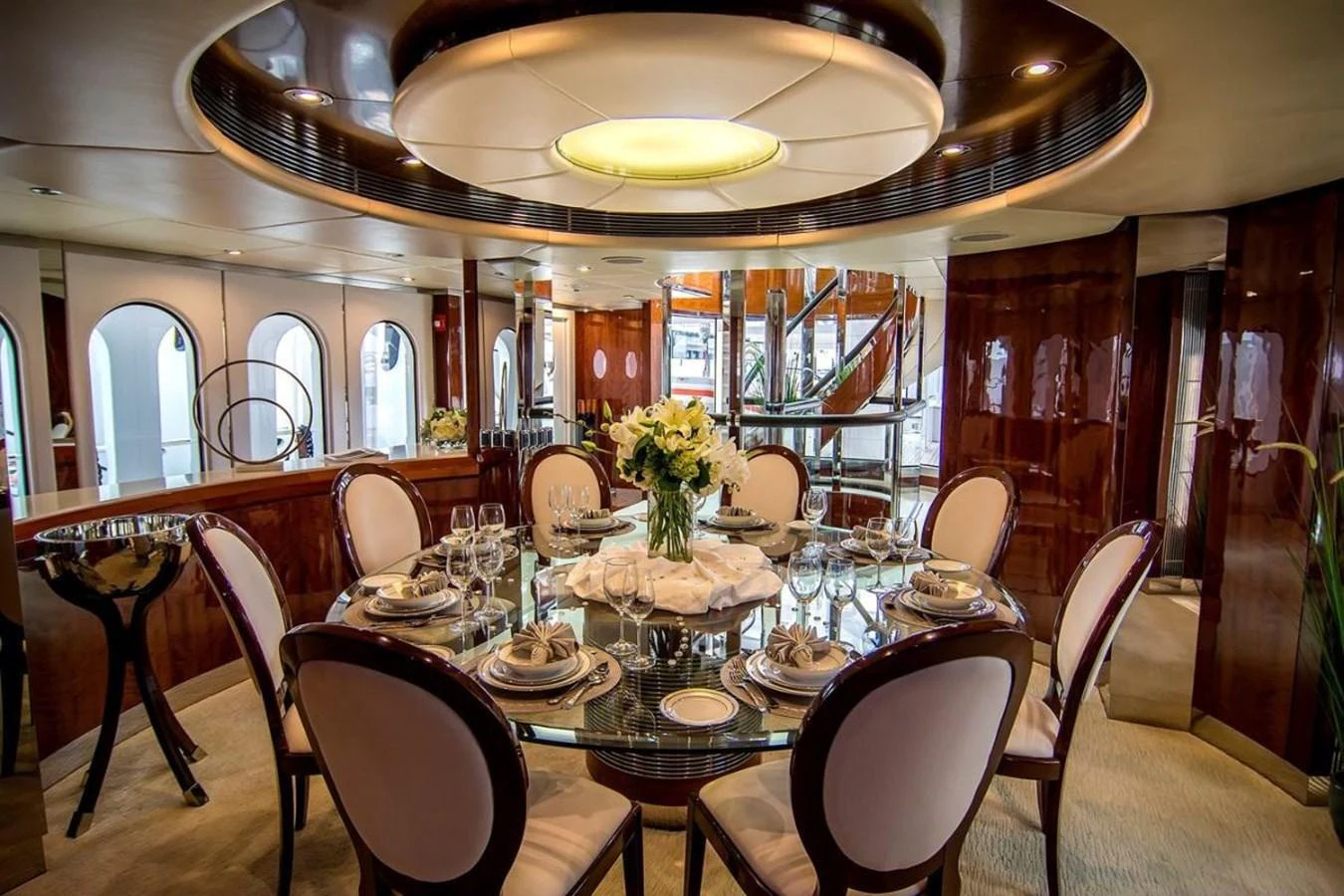 a dining room with a table set for a meal aboard ALL STAR 1 Yacht for Sale