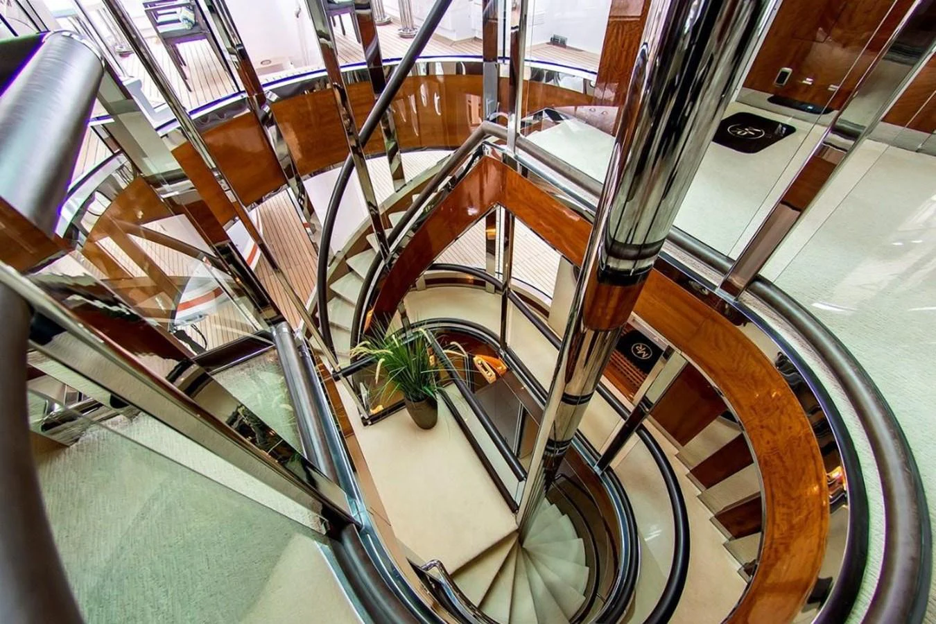 a large room with several escalators aboard ALL STAR 1 Yacht for Sale