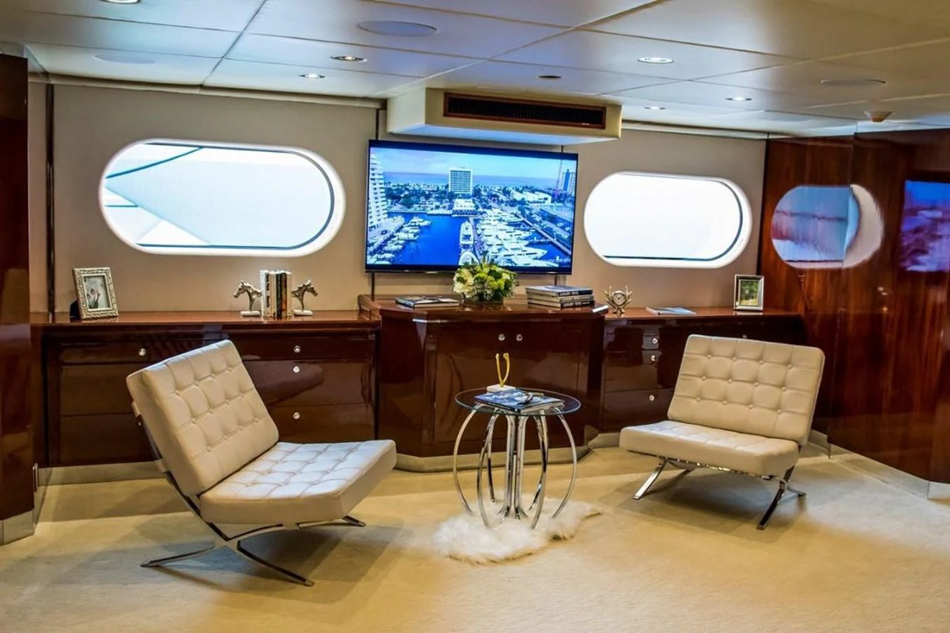 a room with chairs and a table aboard ALL STAR 1 Yacht for Sale
