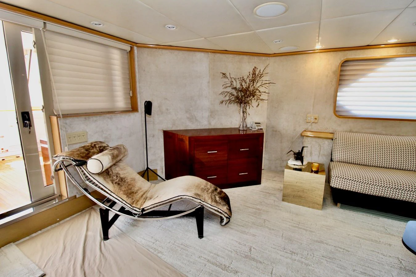 a room with a couch and a chair aboard MAVERICK Yacht for Sale