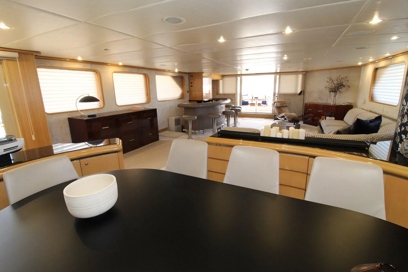 a large kitchen with a table aboard MAVERICK Yacht for Sale