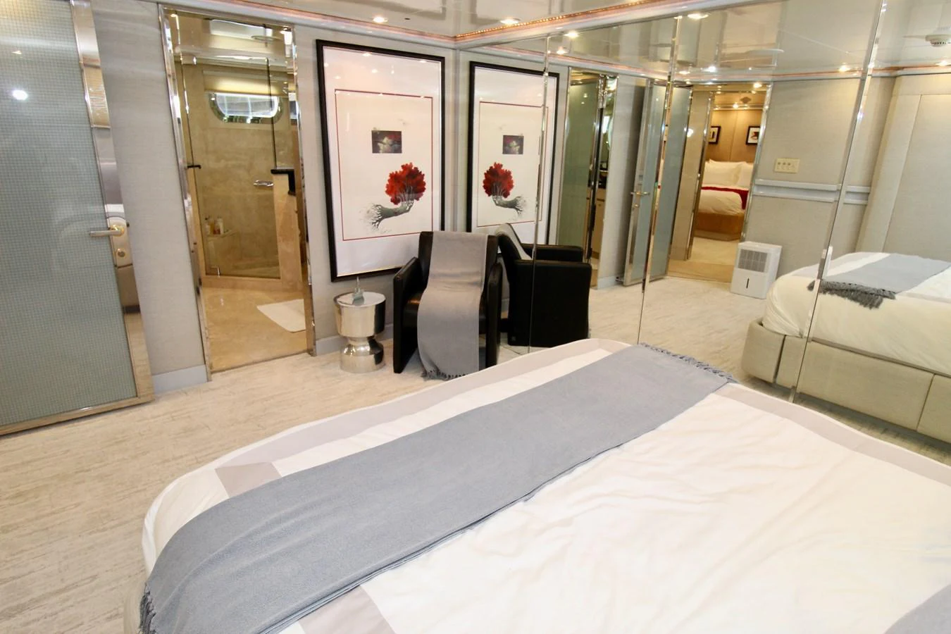 a room with a table and chairs aboard MAVERICK Yacht for Sale