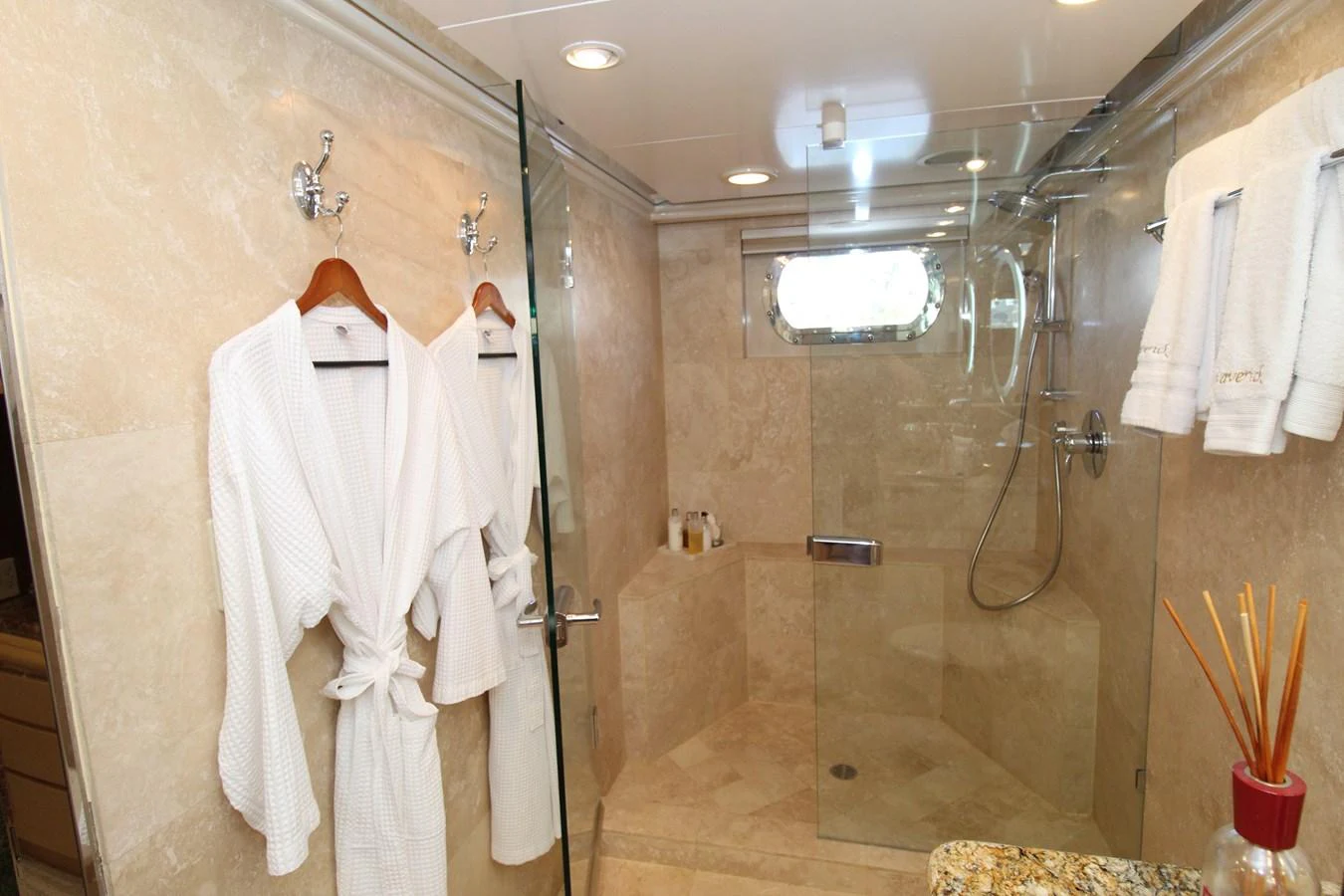 a bathroom with a shower aboard MAVERICK Yacht for Sale