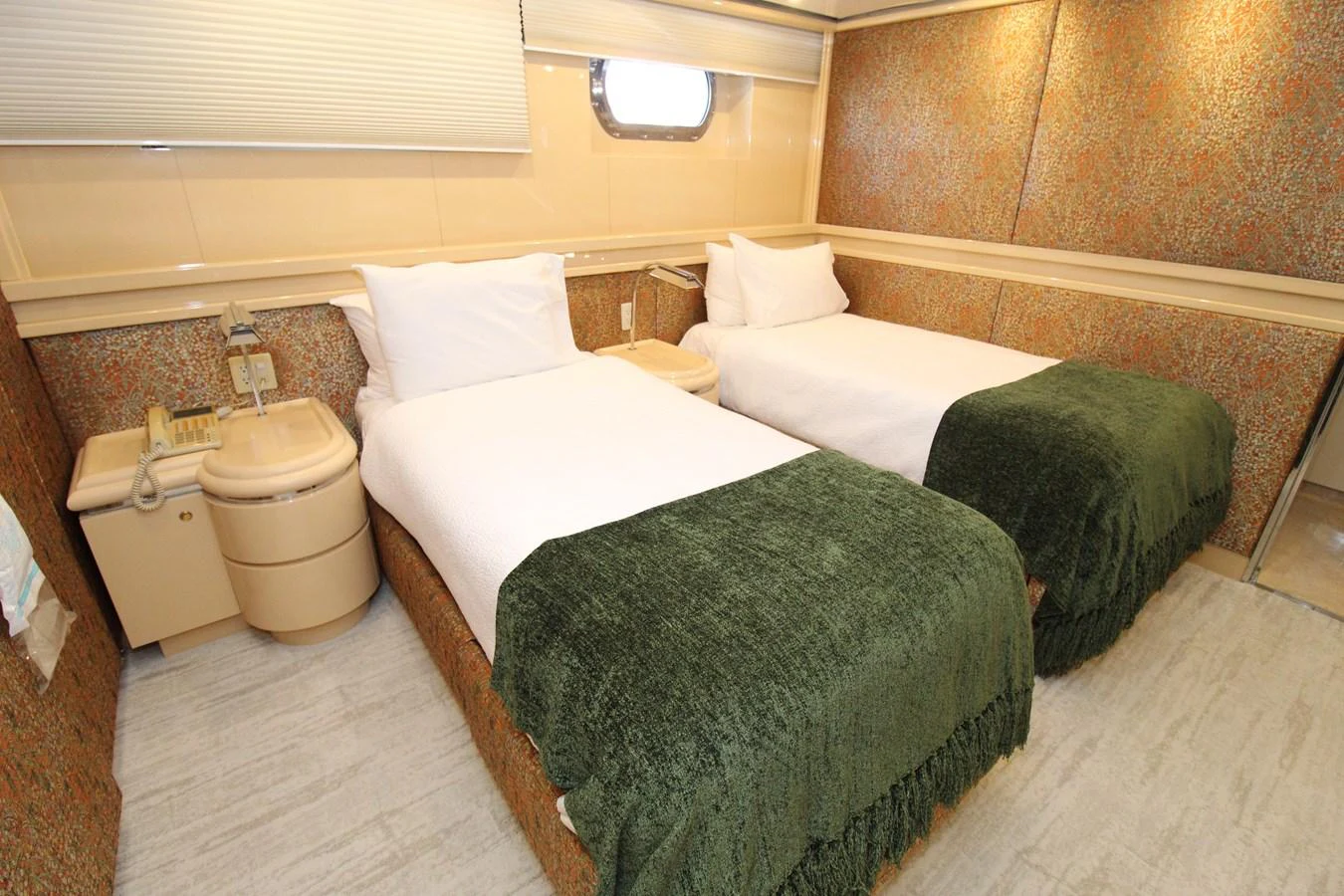 a couple of beds in a room aboard MAVERICK Yacht for Sale