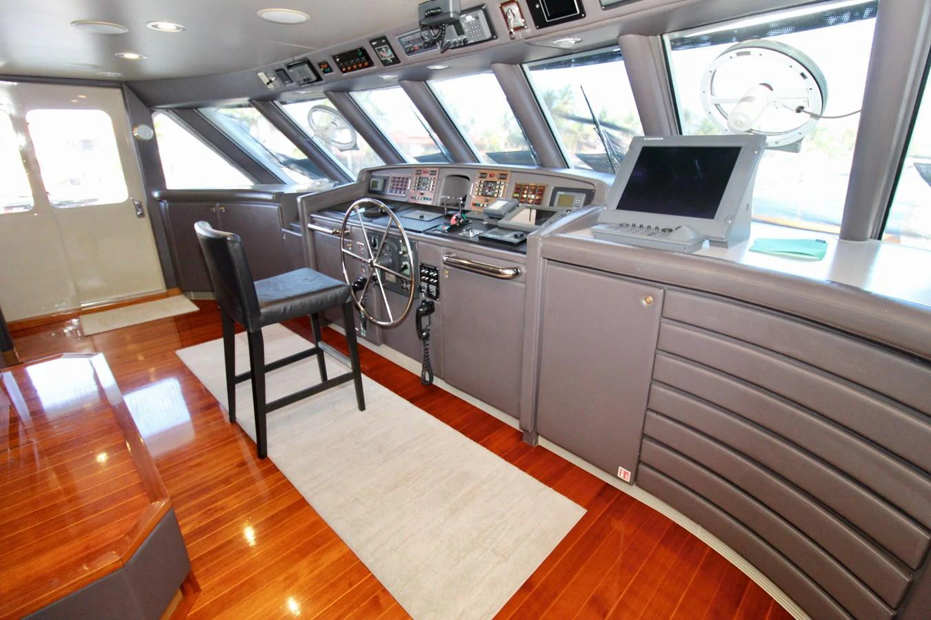 a kitchen with a large window aboard MAVERICK Yacht for Sale
