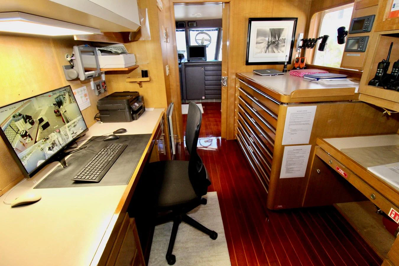 a room with a desk and computer aboard MAVERICK Yacht for Sale