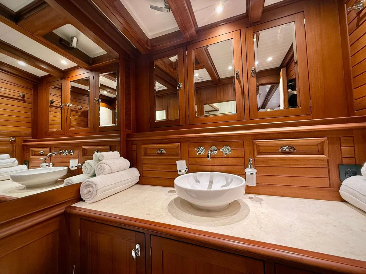 a bathroom with a sink and a mirror aboard NAMUUN Yacht for Sale