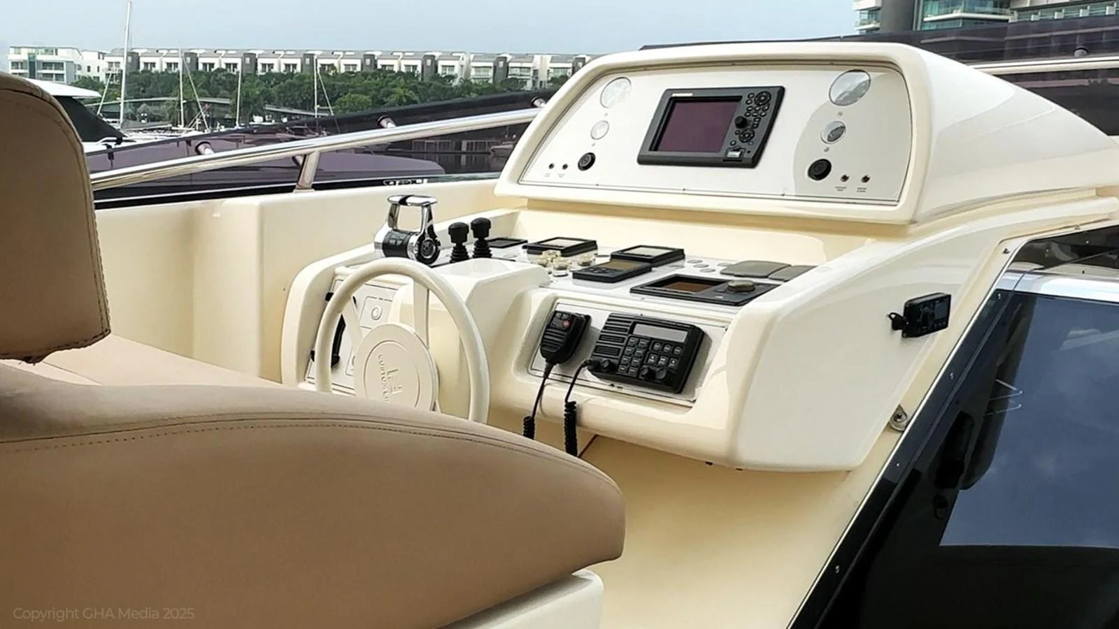 a car with a radio in the driver's seat aboard OXYGEN Yacht for Sale