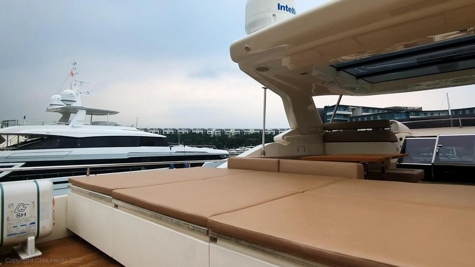 a boat docked at a pier aboard OXYGEN Yacht for Sale