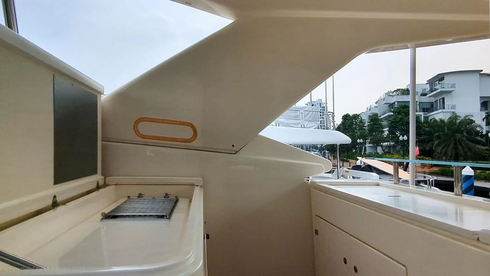 a white house with a large window aboard OXYGEN Yacht for Sale