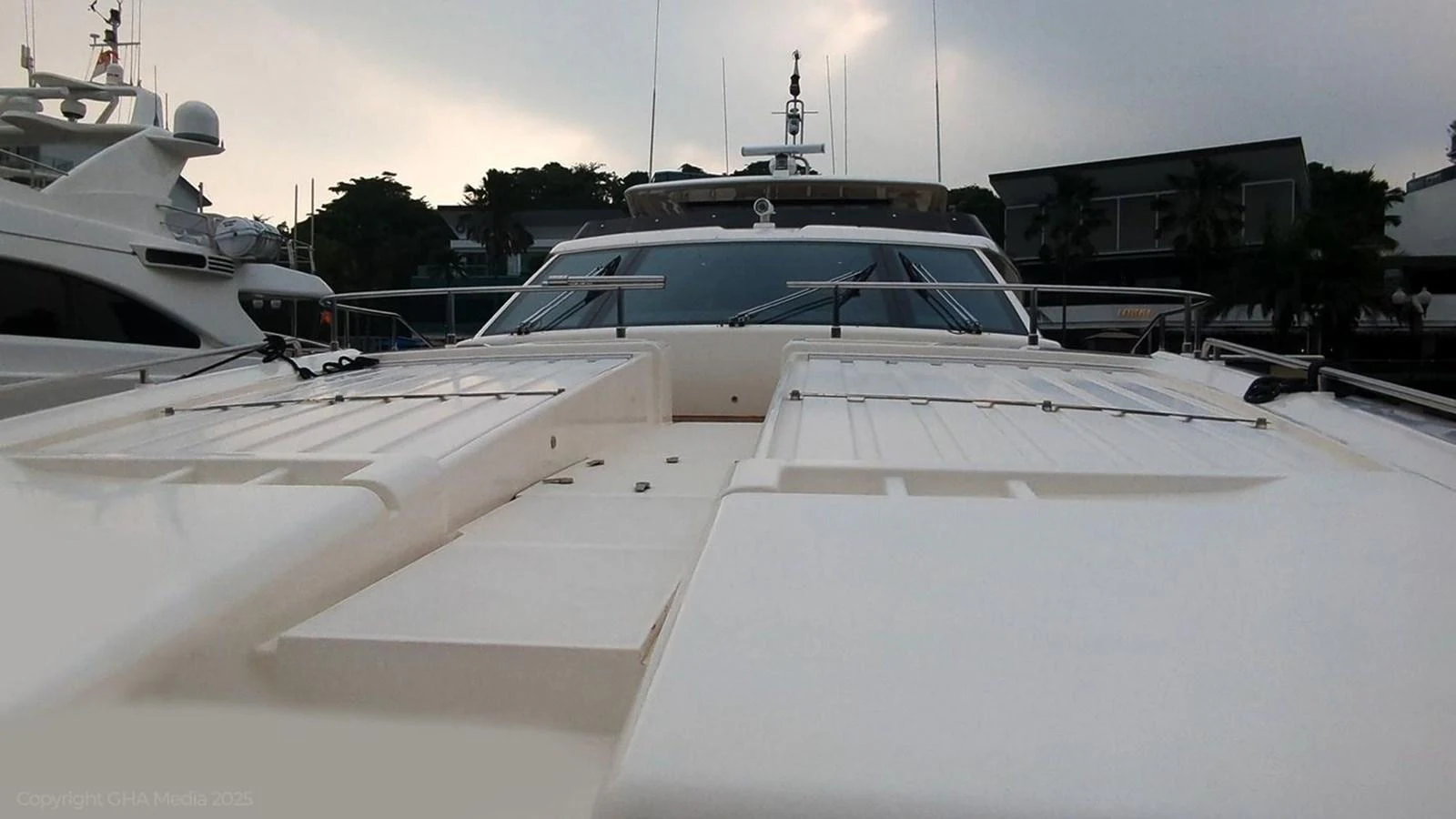 a row of white boats aboard OXYGEN Yacht for Sale