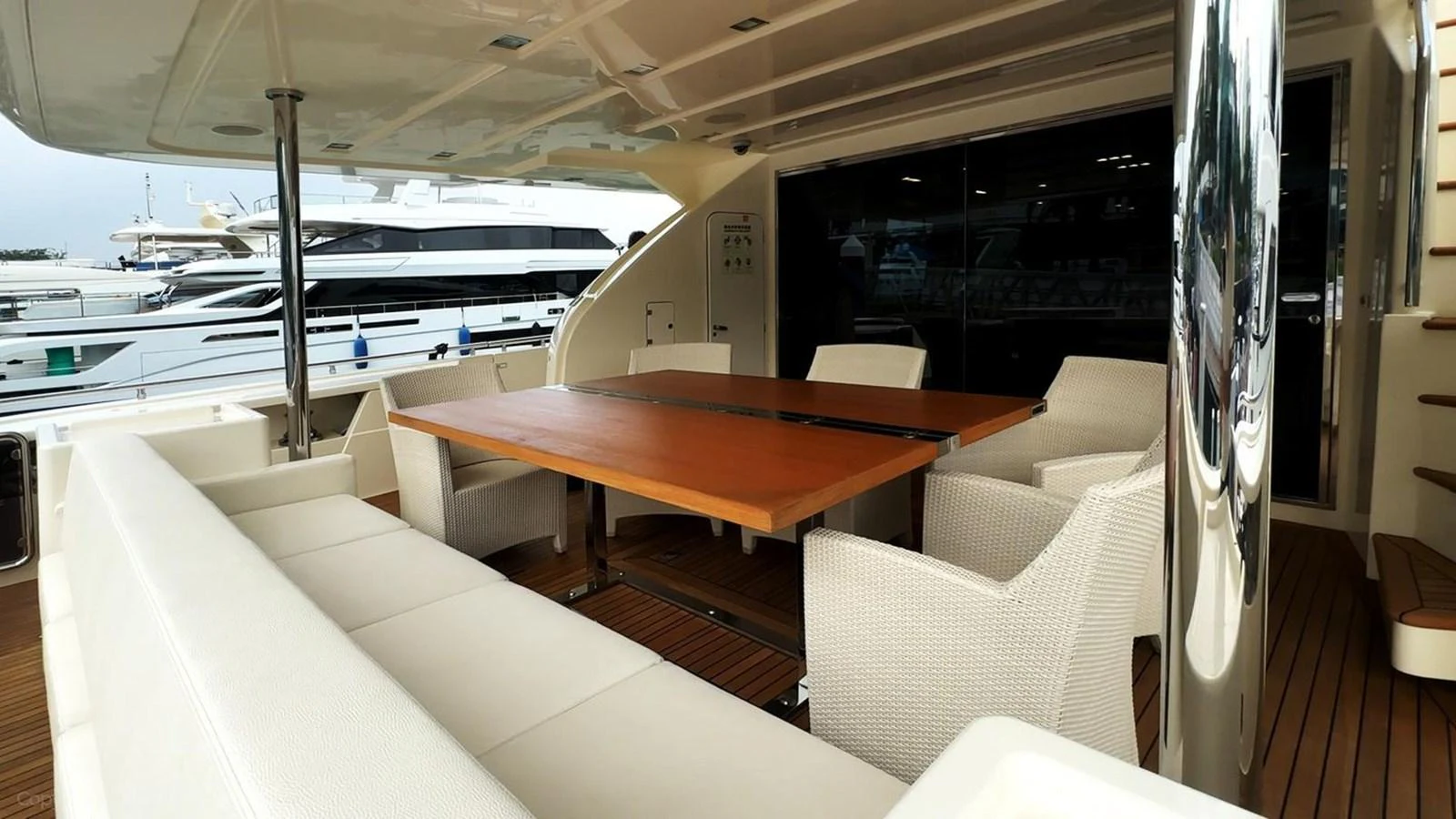 a room with a table and chairs aboard OXYGEN Yacht for Sale
