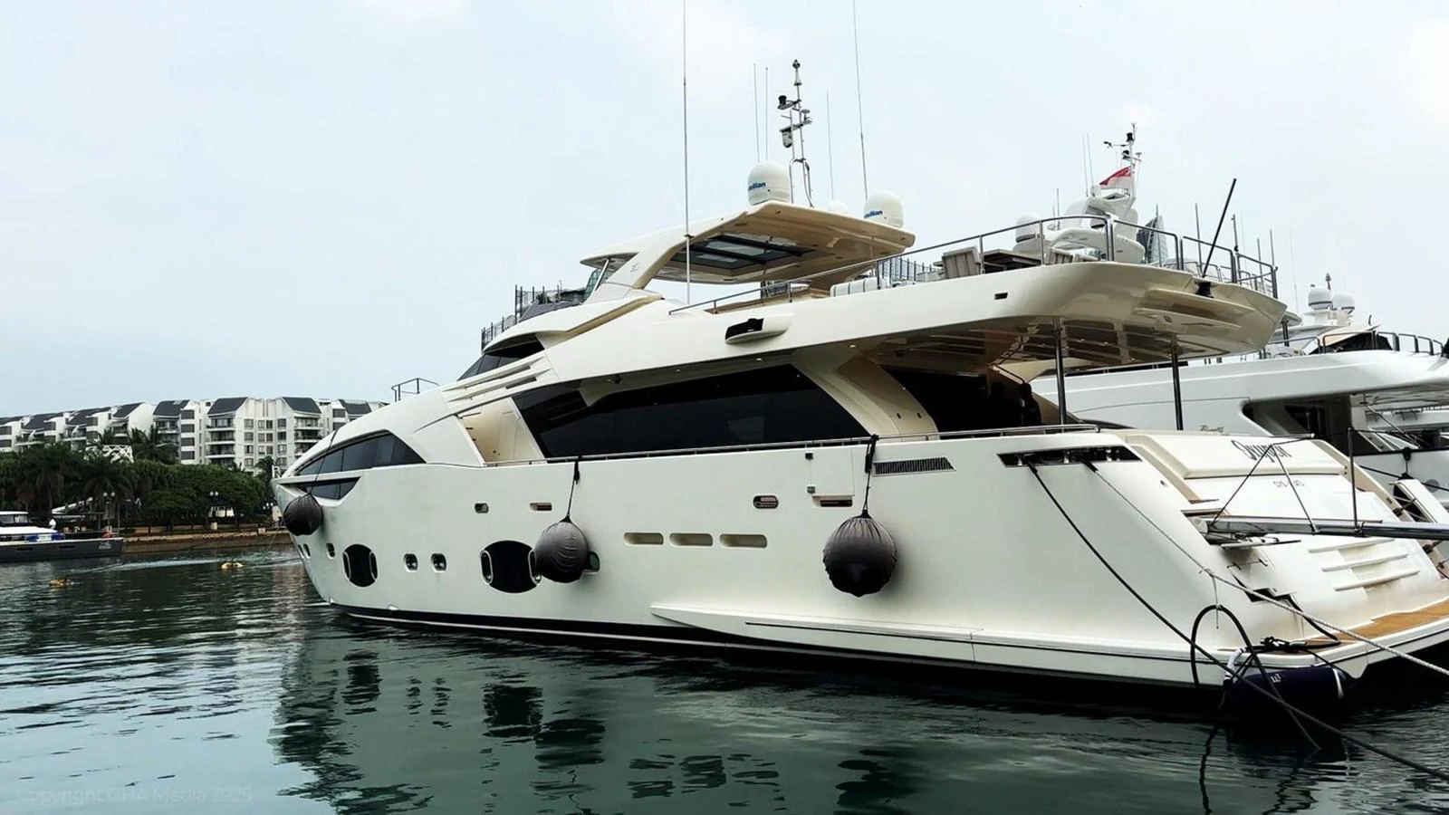 a white yacht on the water aboard OXYGEN Yacht for Sale