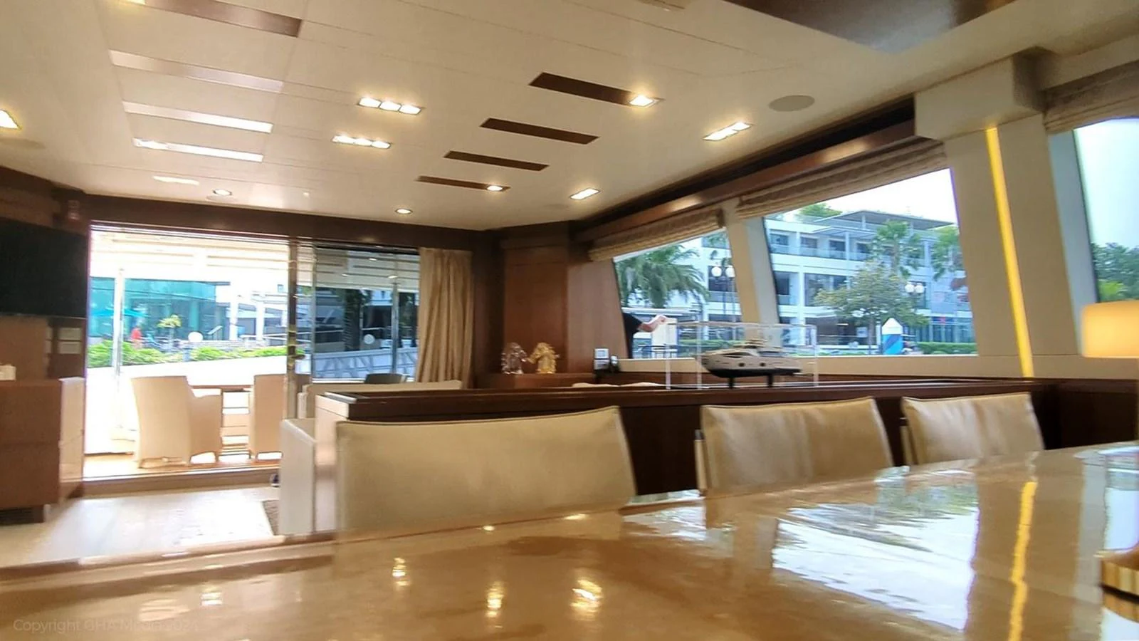 a room with couches and a table aboard OXYGEN Yacht for Sale