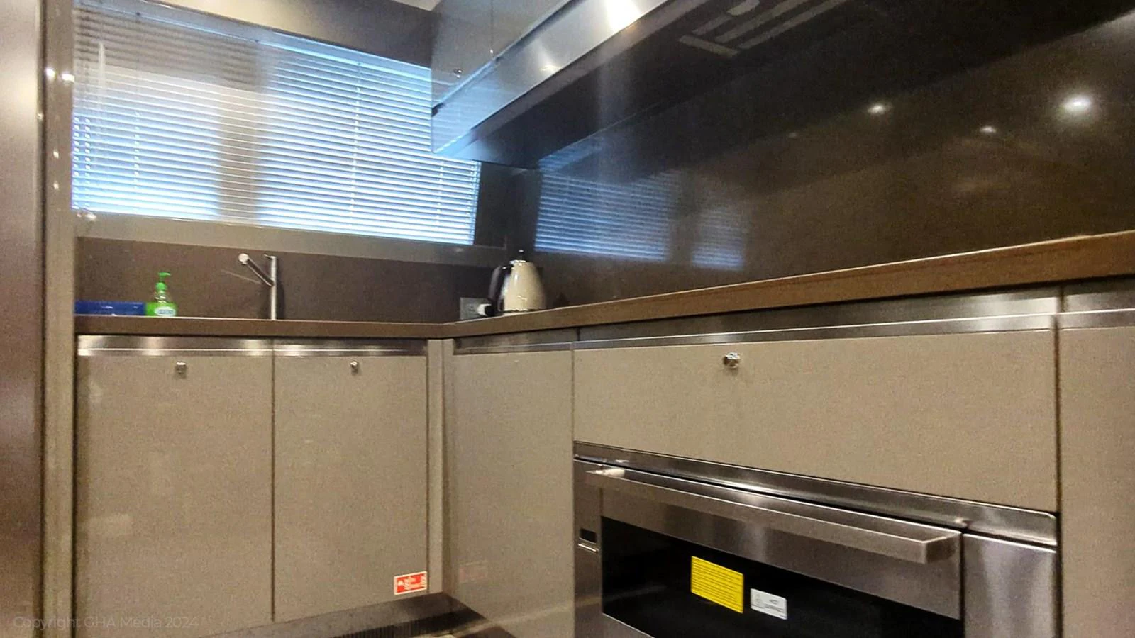 a kitchen with a large oven aboard OXYGEN Yacht for Sale