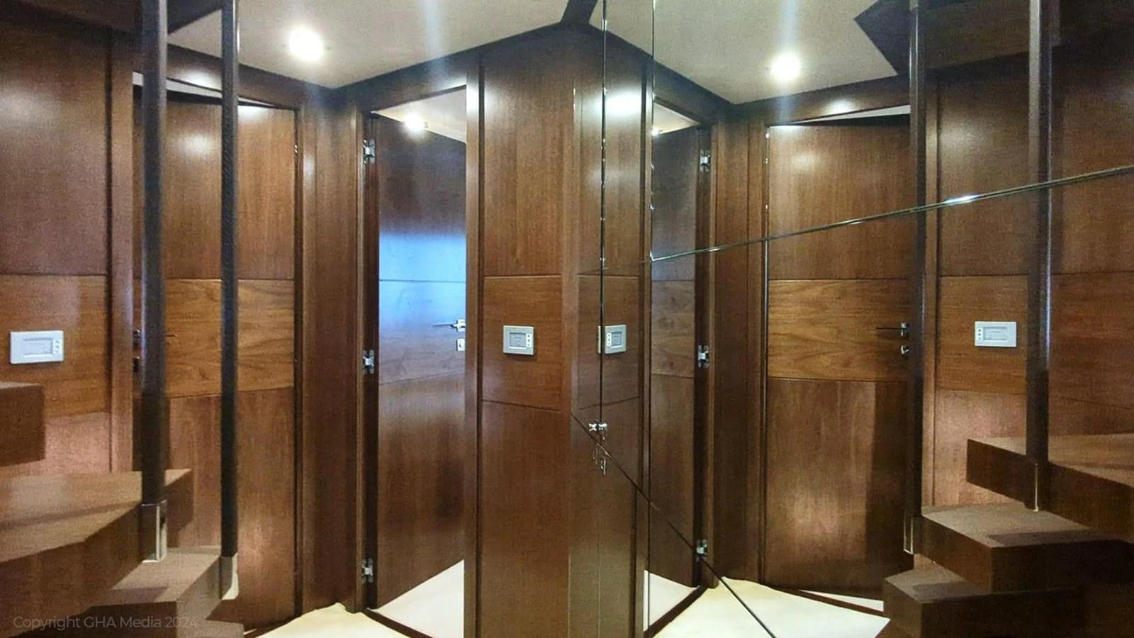 a room with wooden walls aboard OXYGEN Yacht for Sale