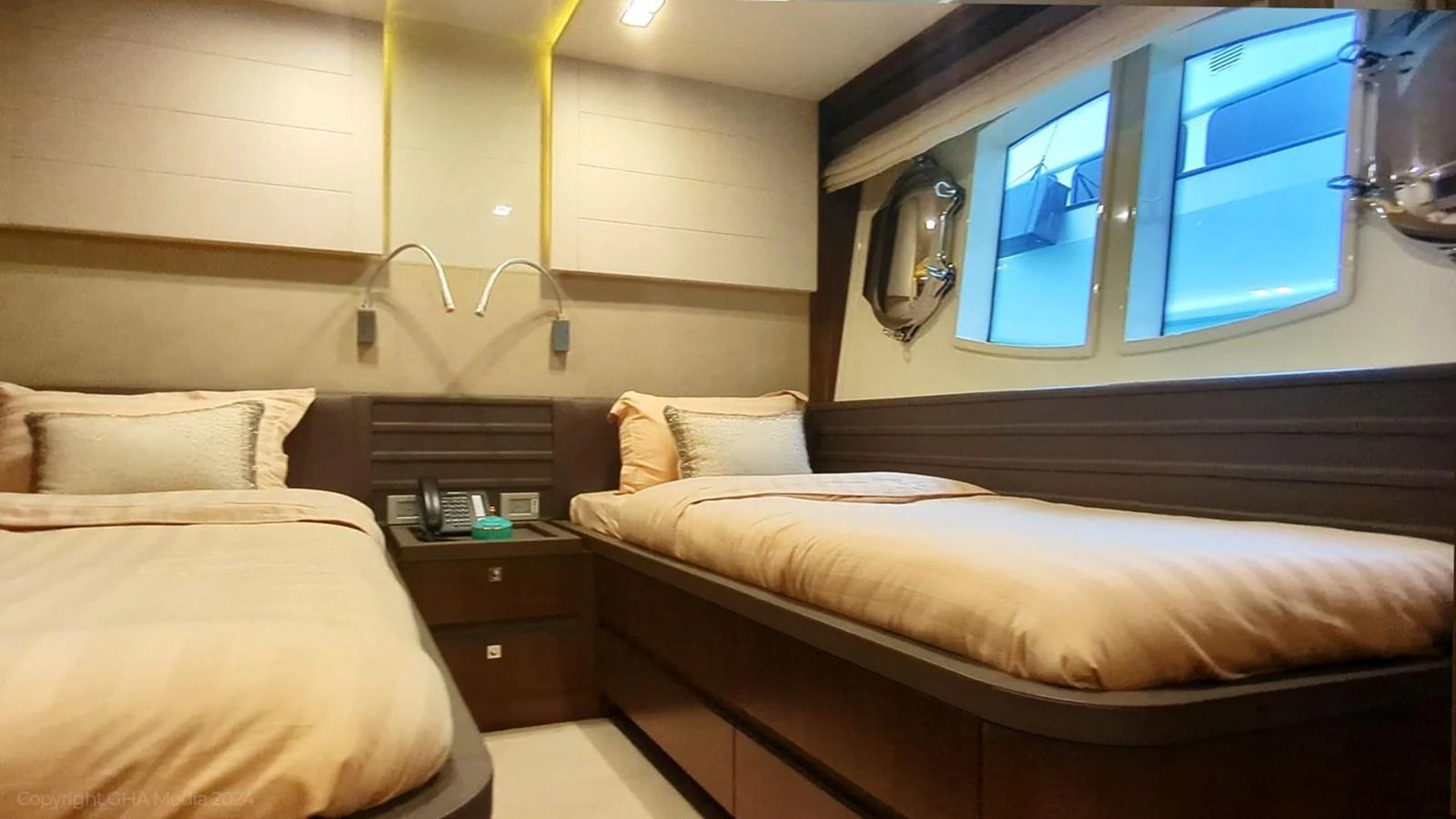 a room with two beds aboard OXYGEN Yacht for Sale