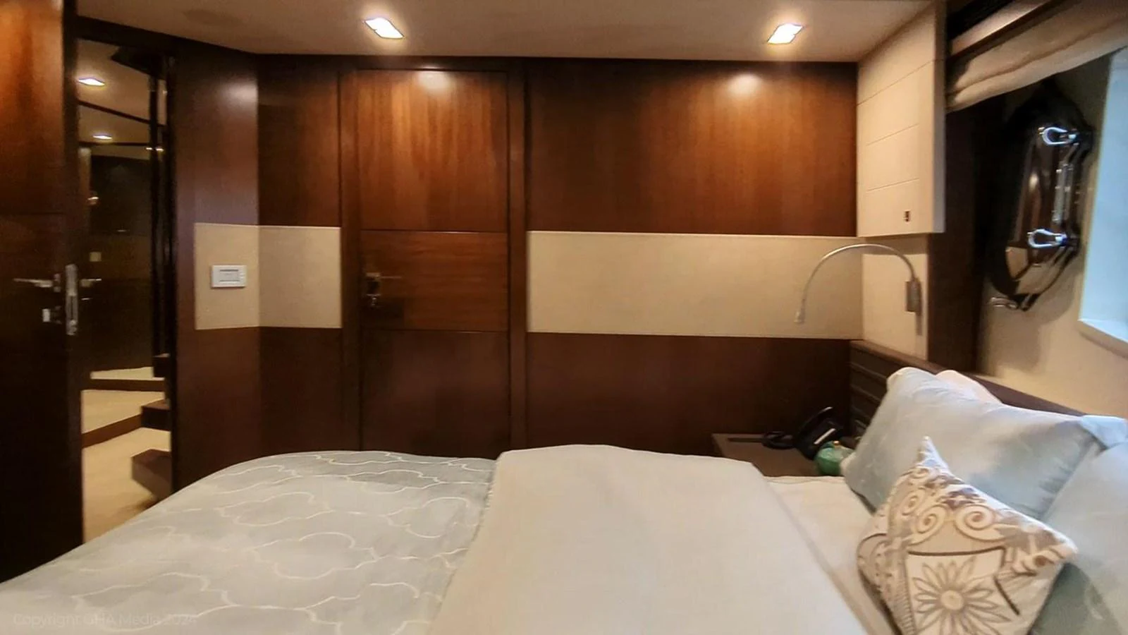 a hotel room with a bed aboard OXYGEN Yacht for Sale