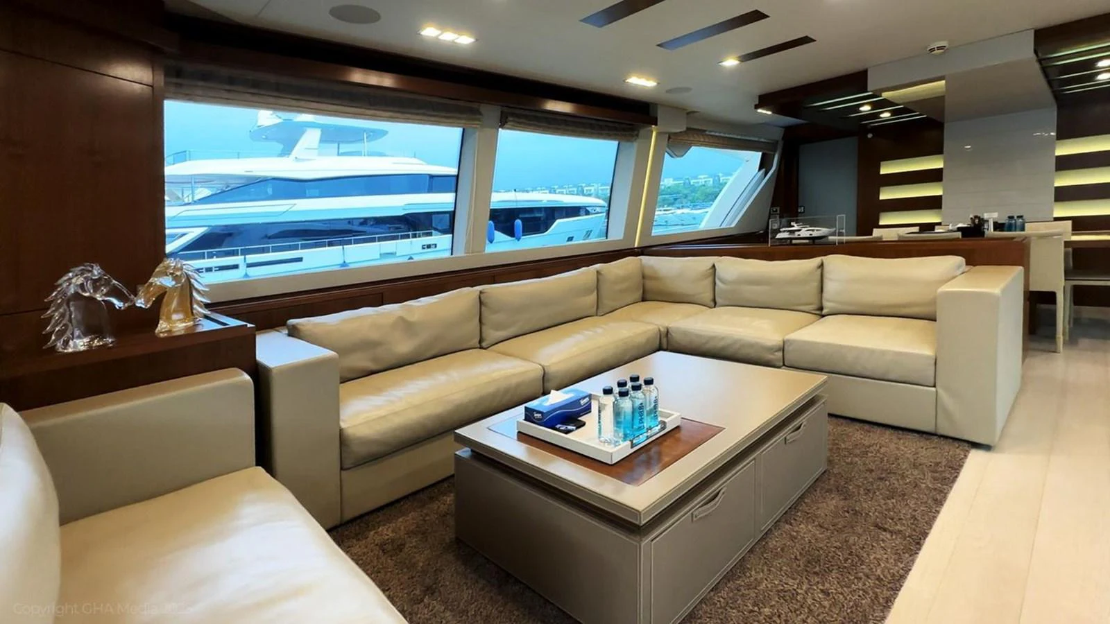 a living room with a couch and a coffee table aboard OXYGEN Yacht for Sale