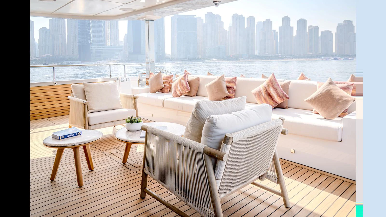 a room with a view of a city and a body of water aboard 100 TERRACE Yacht for Sale