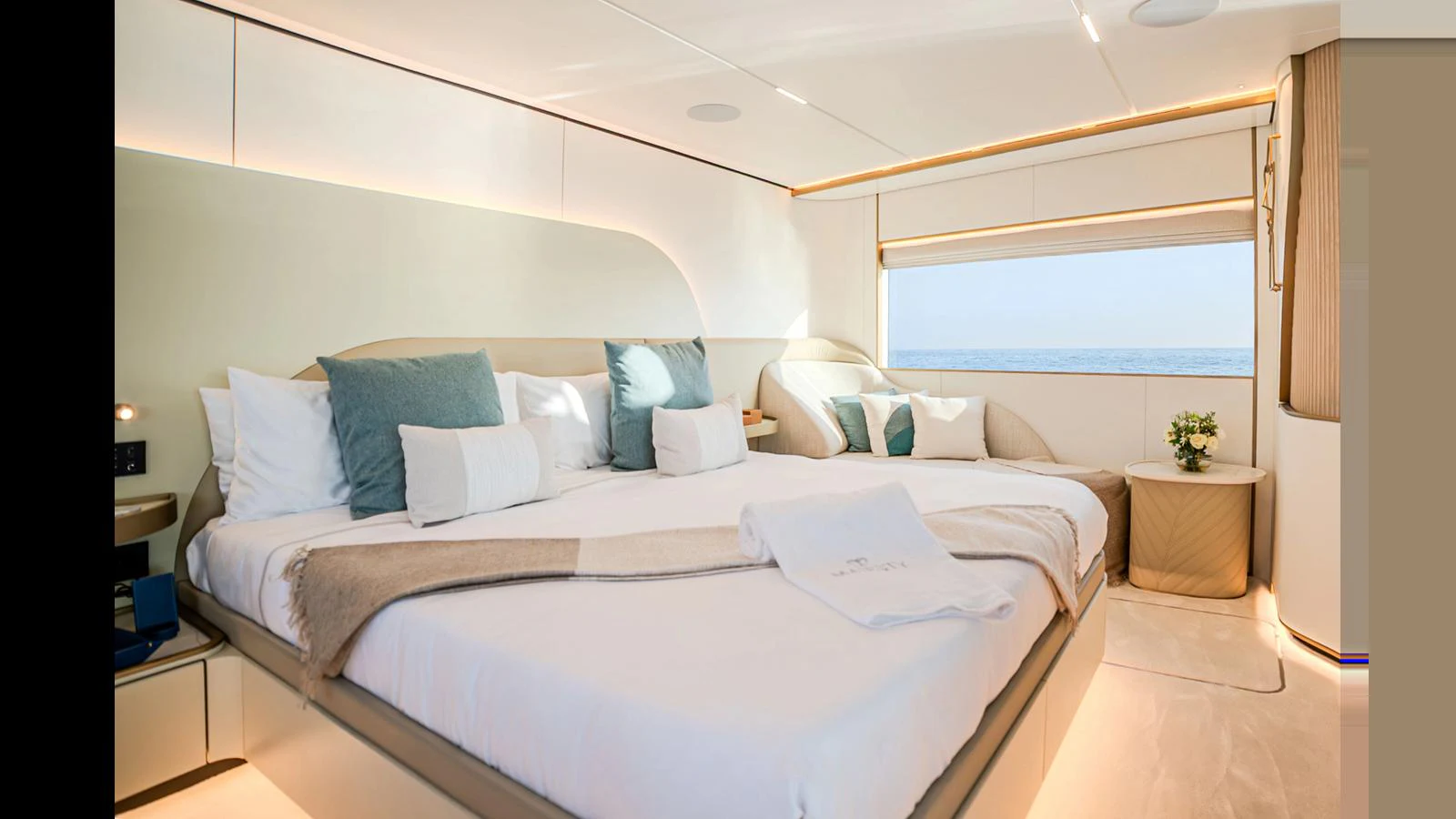 a bed with white sheets aboard 100 TERRACE Yacht for Sale