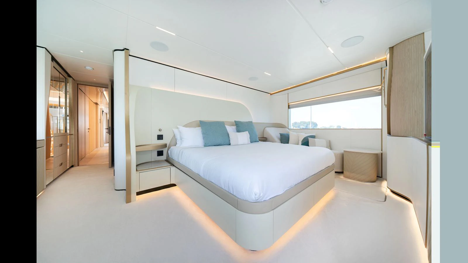 a room with a bed and a desk aboard 100 TERRACE Yacht for Sale