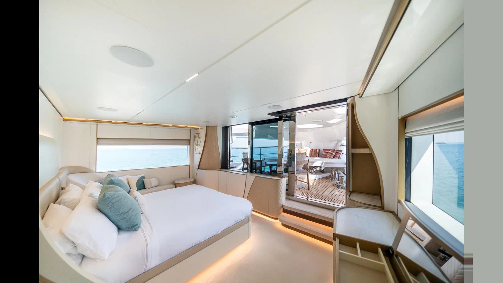 a room with a bed and a large window aboard 100 TERRACE Yacht for Sale