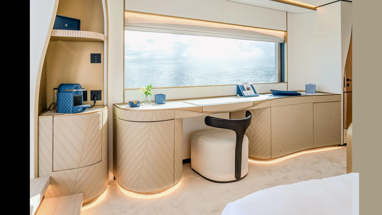 a desk with a chair and a window aboard 100 TERRACE Yacht for Sale