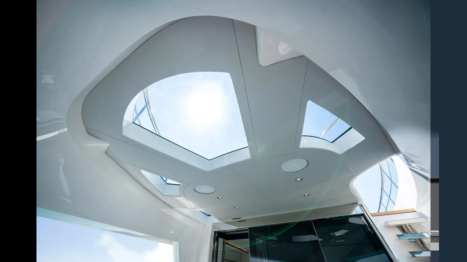a white ceiling with a round window aboard 100 TERRACE Yacht for Sale
