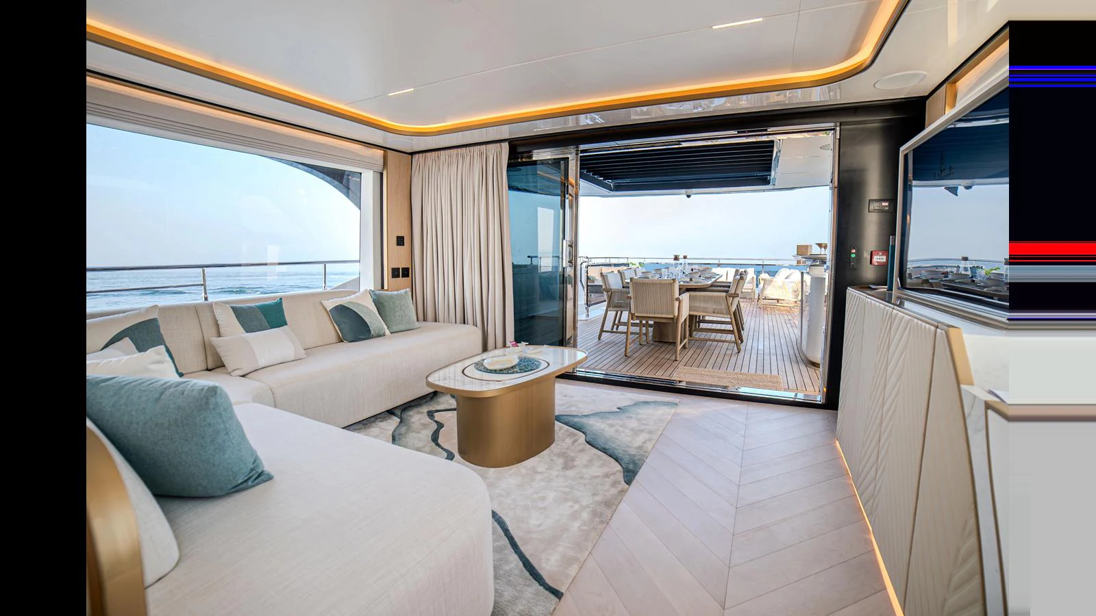 a living room with a large window aboard 100 TERRACE Yacht for Sale