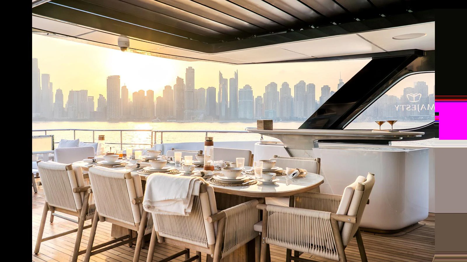 a table set for a meal aboard 100 TERRACE Yacht for Sale