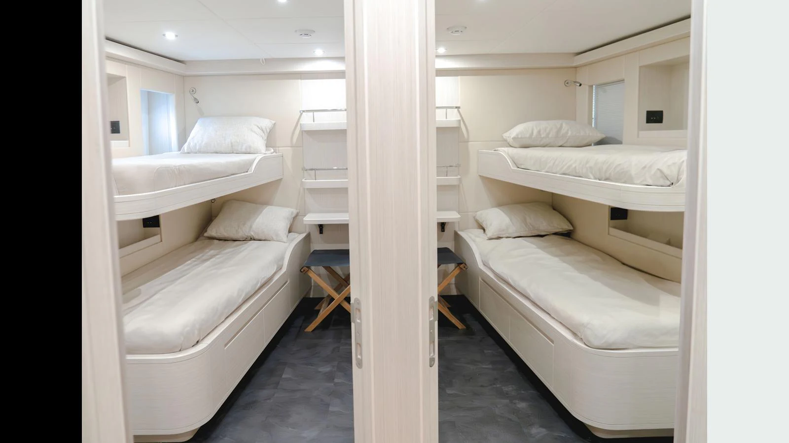 a room with bunk beds aboard 100 TERRACE Yacht for Sale