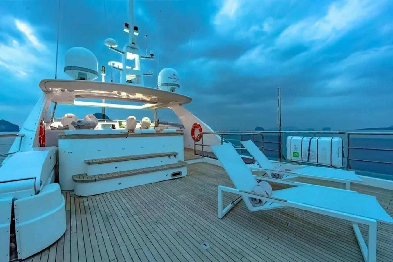 a deck with a boat on it aboard BLUE MOON Yacht for Sale