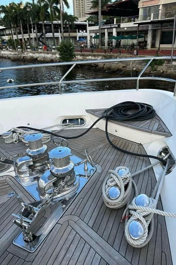 a boat with a hood aboard BLUE MOON Yacht for Sale