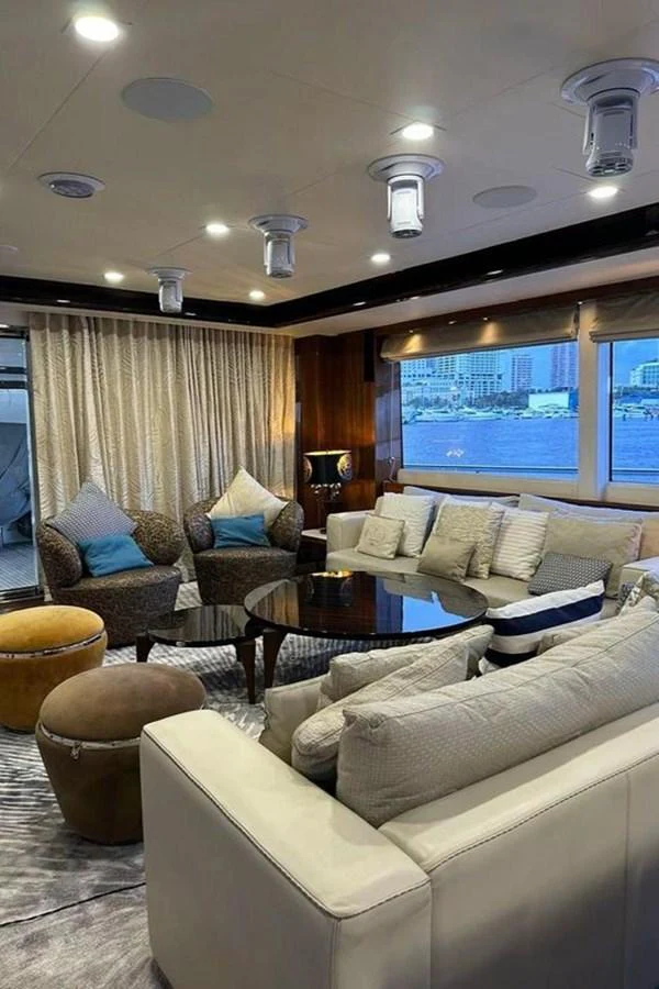 a living room with a large window aboard BLUE MOON Yacht for Sale