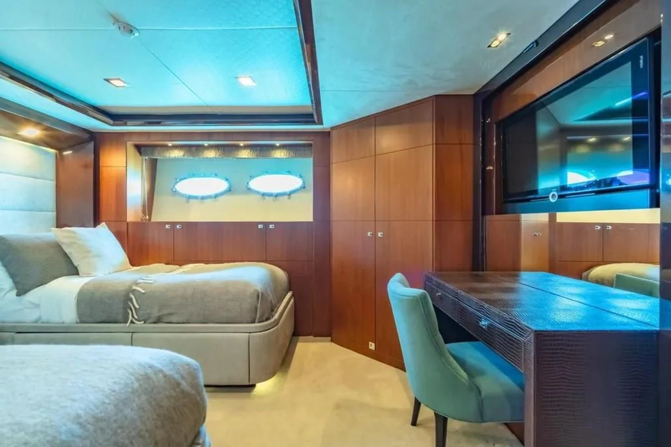 a room with a table and couch aboard BLUE MOON Yacht for Sale