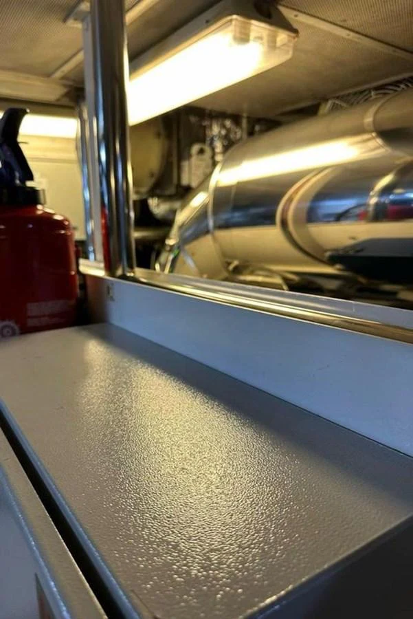 a train with a red suitcase aboard BLUE MOON Yacht for Sale
