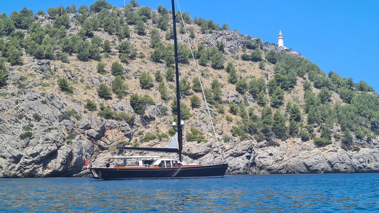 a boat sailing on the water aboard AKALAM Yacht for Sale