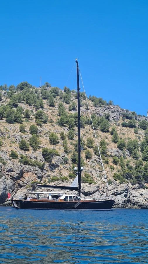 a boat sailing on water aboard AKALAM Yacht for Sale