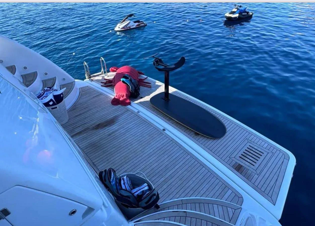 a boat with a person on it aboard BLUE MOON Yacht for Sale