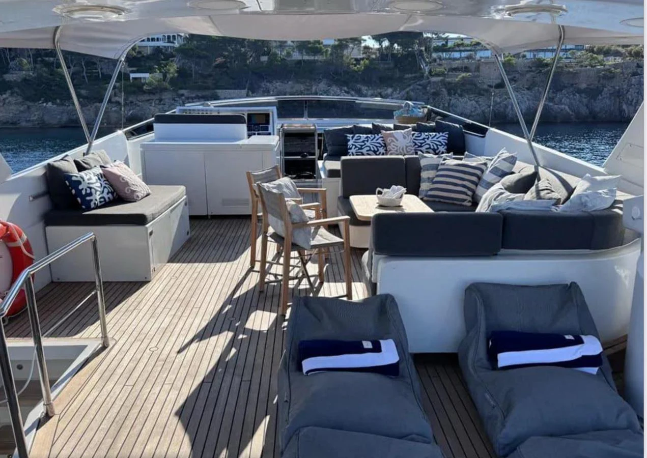 a deck with a view of a city aboard BLUE MOON Yacht for Sale