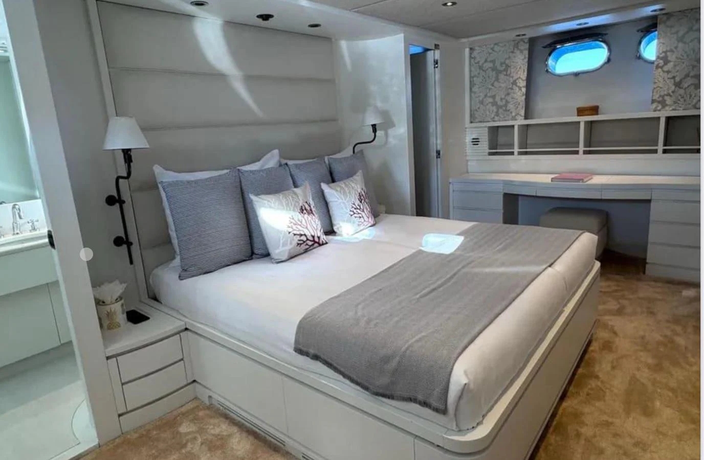 a bed in a room aboard BLUE MOON Yacht for Sale