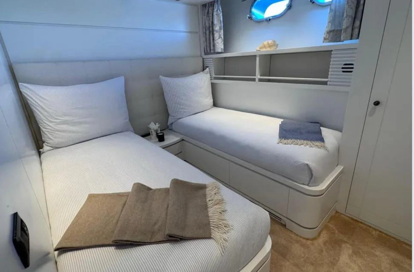 a room with two beds aboard BLUE MOON Yacht for Sale