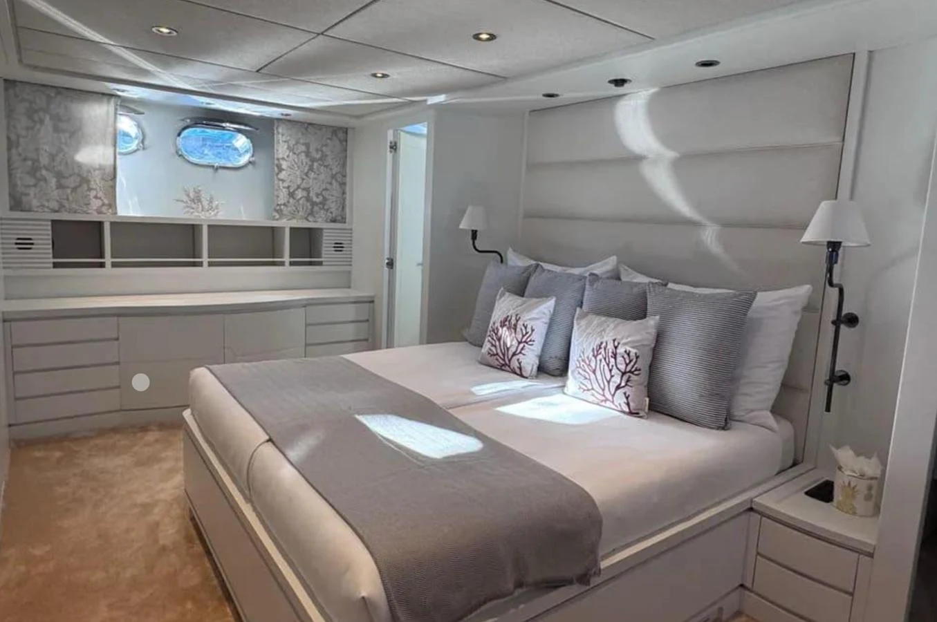 a bed in a room aboard BLUE MOON Yacht for Sale